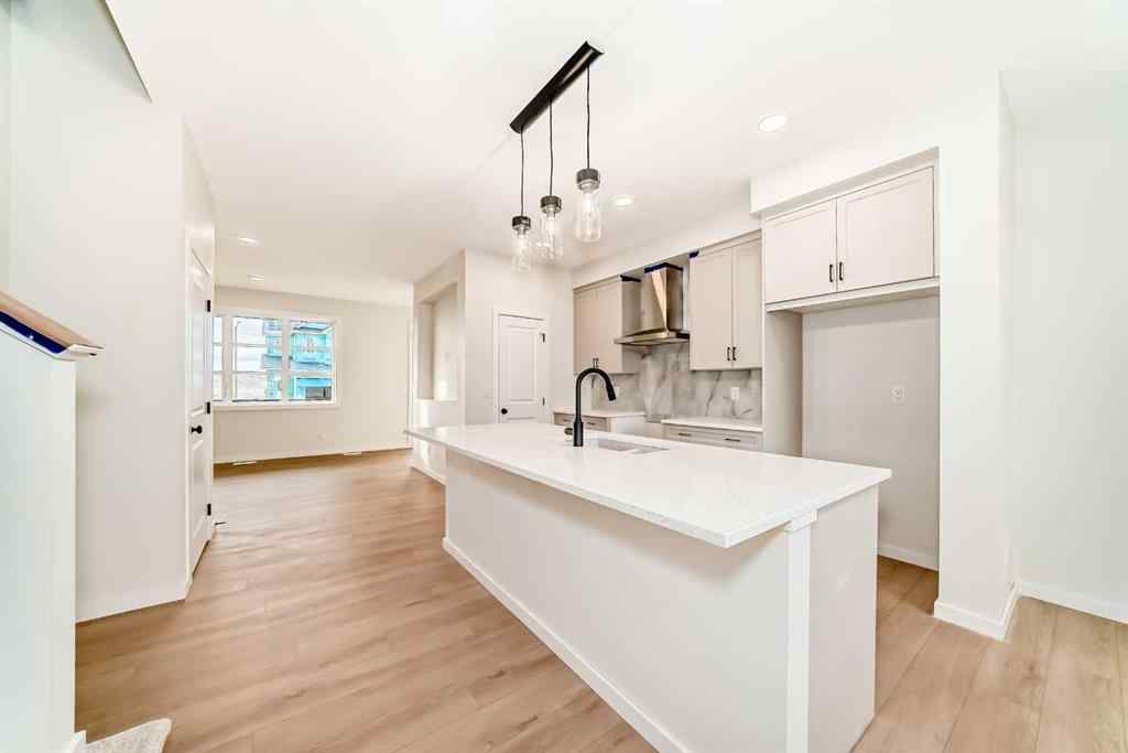 MLS&reg; # A2262818 - 19750 Sheriff King Street SW in Belmont Calgary, Residential Open Houses