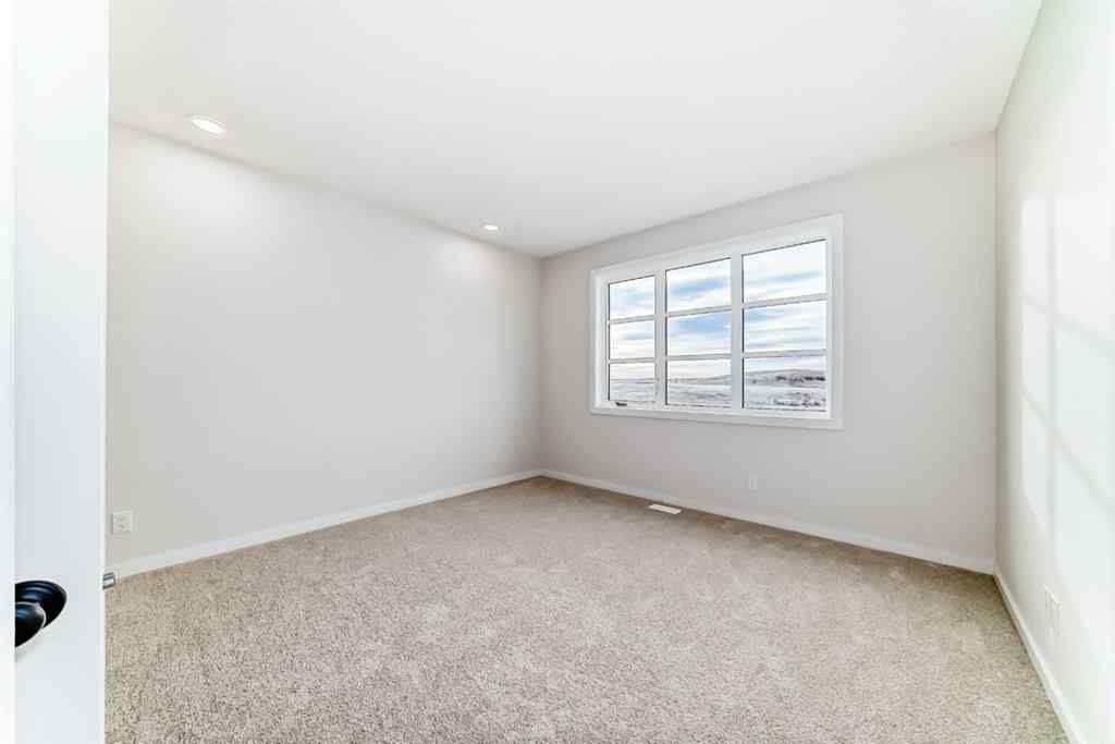 MLS&reg; # A2262818 - 19750 Sheriff King Street SW in Belmont Calgary, Residential Open Houses