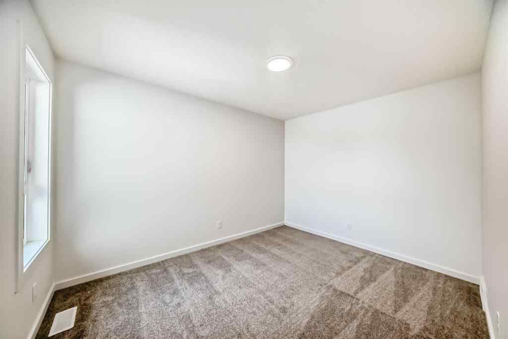 MLS® A2262825 - 33 Royston Grove NW in Haskayne Calgary, Residential