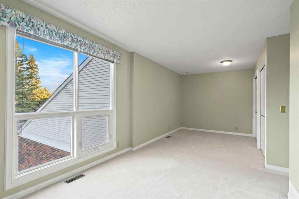 MLS® A2262871 - Unit #23 275 Woodridge Drive SW in Woodlands Calgary, Residential