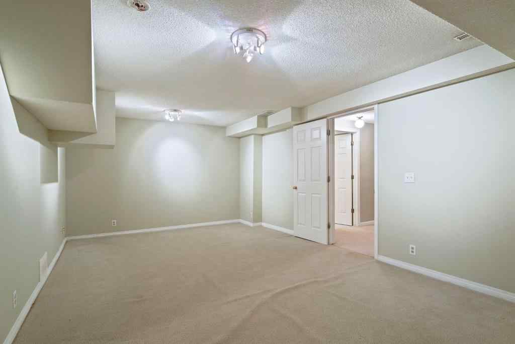 MLS® A2262871 - Unit #23 275 Woodridge Drive SW in Woodlands Calgary, Residential