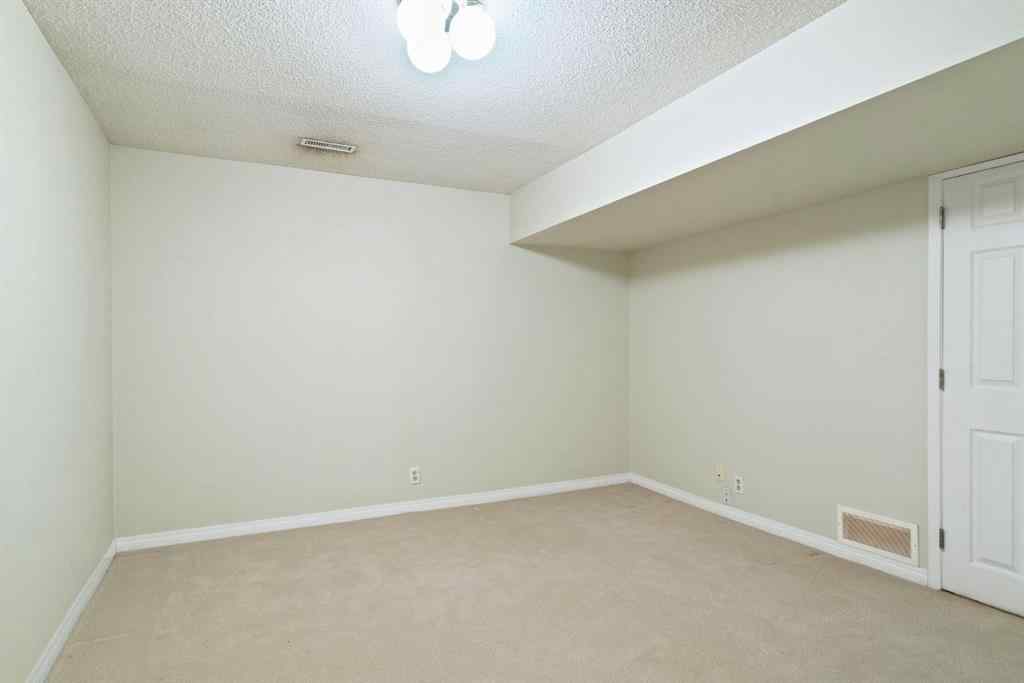 MLS® A2262871 - Unit #23 275 Woodridge Drive SW in Woodlands Calgary, Residential