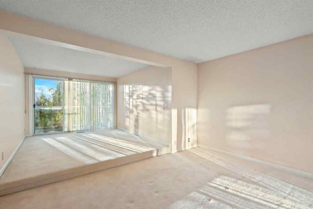 MLS® A2262871 - Unit #23 275 Woodridge Drive SW in Woodlands Calgary, Residential