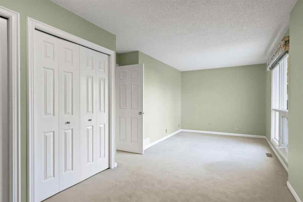 MLS® A2262871 - Unit #23 275 Woodridge Drive SW in Woodlands Calgary, Residential