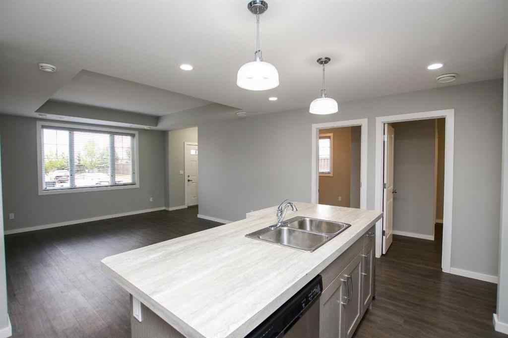 MLS® A2262883 - Unit #102 43 Reid Court  in Ryders Ridge Sylvan Lake, Residential