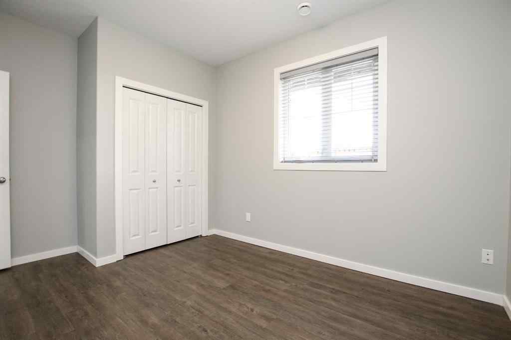 MLS® A2262883 - Unit #102 43 Reid Court  in Ryders Ridge Sylvan Lake, Residential