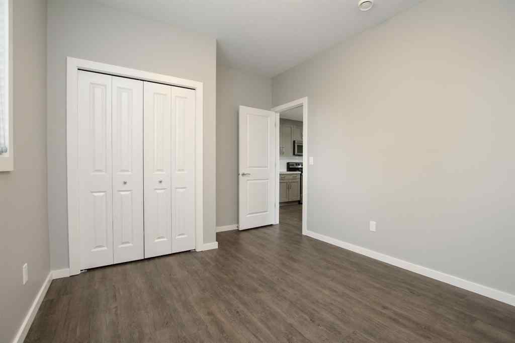 MLS® A2262883 - Unit #102 43 Reid Court  in Ryders Ridge Sylvan Lake, Residential