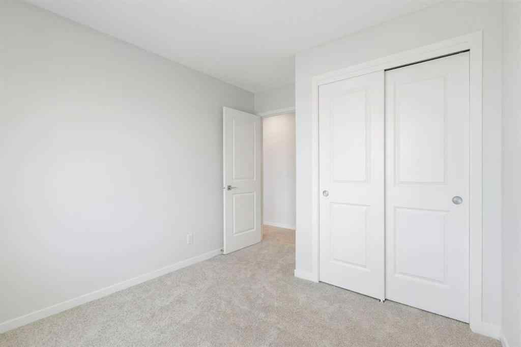 MLS® A2262894 - 688 Buffaloberry Manor SE in Ricardo Ranch Calgary, Residential