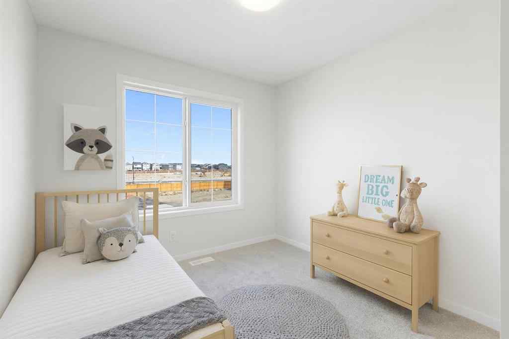 MLS® A2262894 - 688 Buffaloberry Manor SE in Ricardo Ranch Calgary, Residential