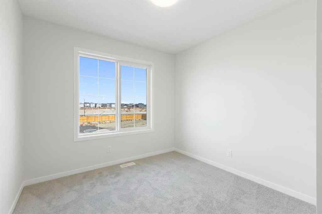 MLS® A2262894 - 688 Buffaloberry Manor SE in Ricardo Ranch Calgary, Residential