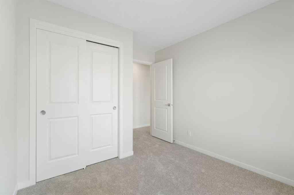 MLS® A2262894 - 688 Buffaloberry Manor SE in Ricardo Ranch Calgary, Residential