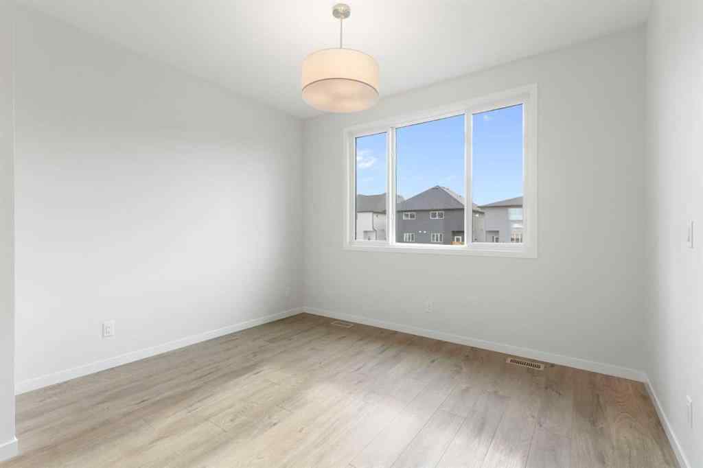 MLS® A2262894 - 688 Buffaloberry Manor SE in Ricardo Ranch Calgary, Residential