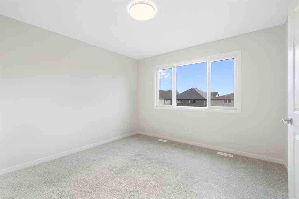 MLS® A2262894 - 688 Buffaloberry Manor SE in Ricardo Ranch Calgary, Residential