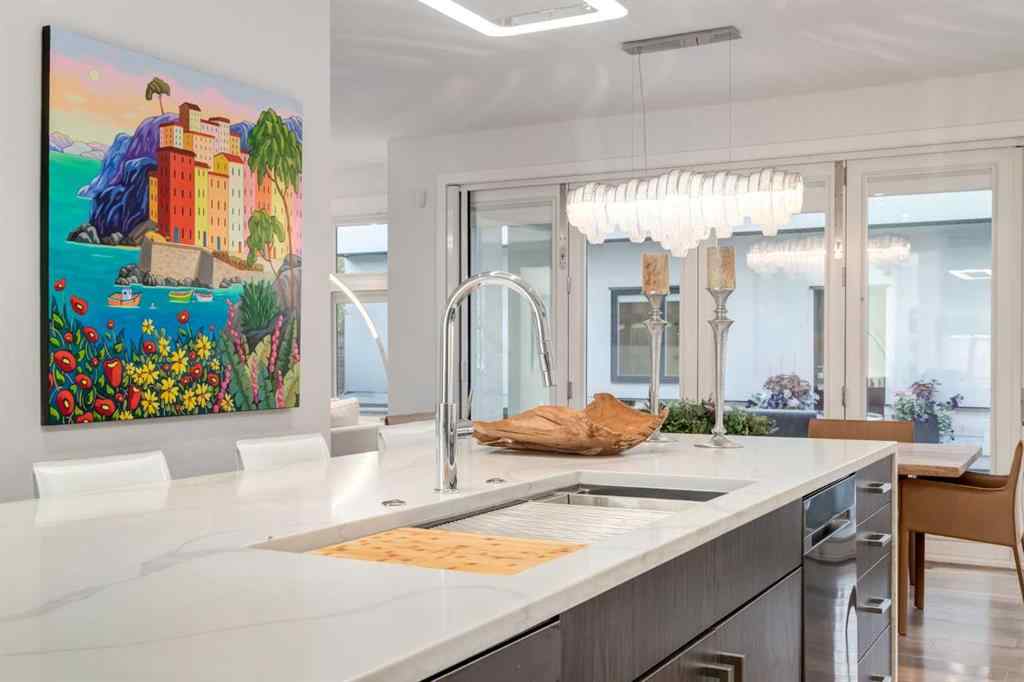 MLS® A2262896 - 134 6 Avenue NW in Crescent Heights Calgary, Residential