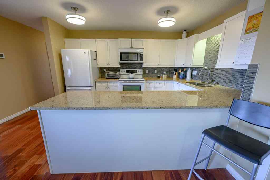 MLS® A2262898 - Unit #209 9919 99 Avenue  in Central Business District Grande Prairie, Residential