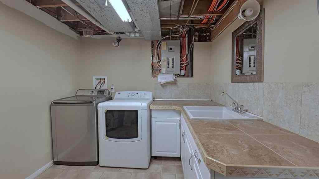 MLS® A2262909 - 247 Shore Drive  in Prairie Royal Estate Rural Rocky View County, Residential