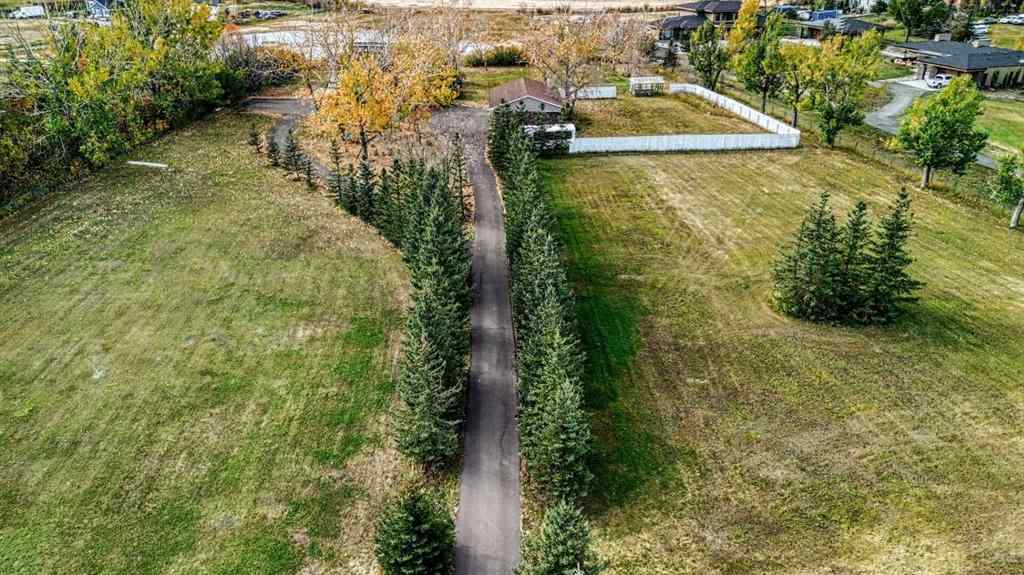 MLS® A2262909 - 247 Shore Drive  in Prairie Royal Estate Rural Rocky View County, Residential