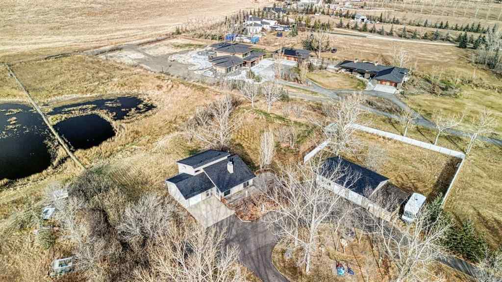 MLS® A2262909 - 247 Shore Drive  in Prairie Royal Estate Rural Rocky View County, Residential