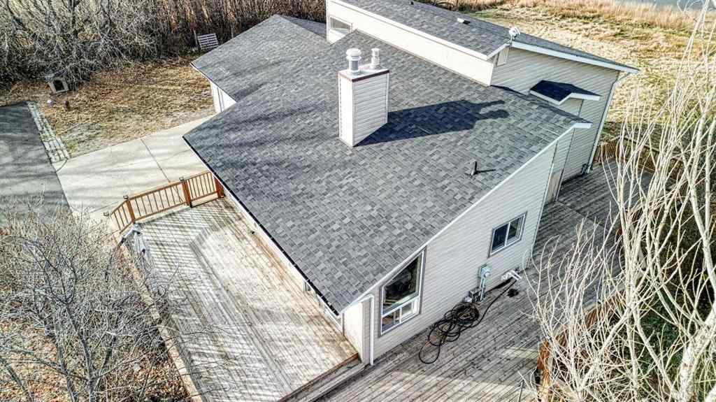 MLS® A2262909 - 247 Shore Drive  in Prairie Royal Estate Rural Rocky View County, Residential