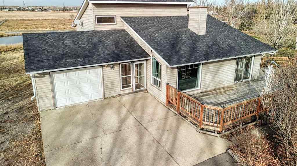 MLS® A2262909 - 247 Shore Drive  in Prairie Royal Estate Rural Rocky View County, Residential