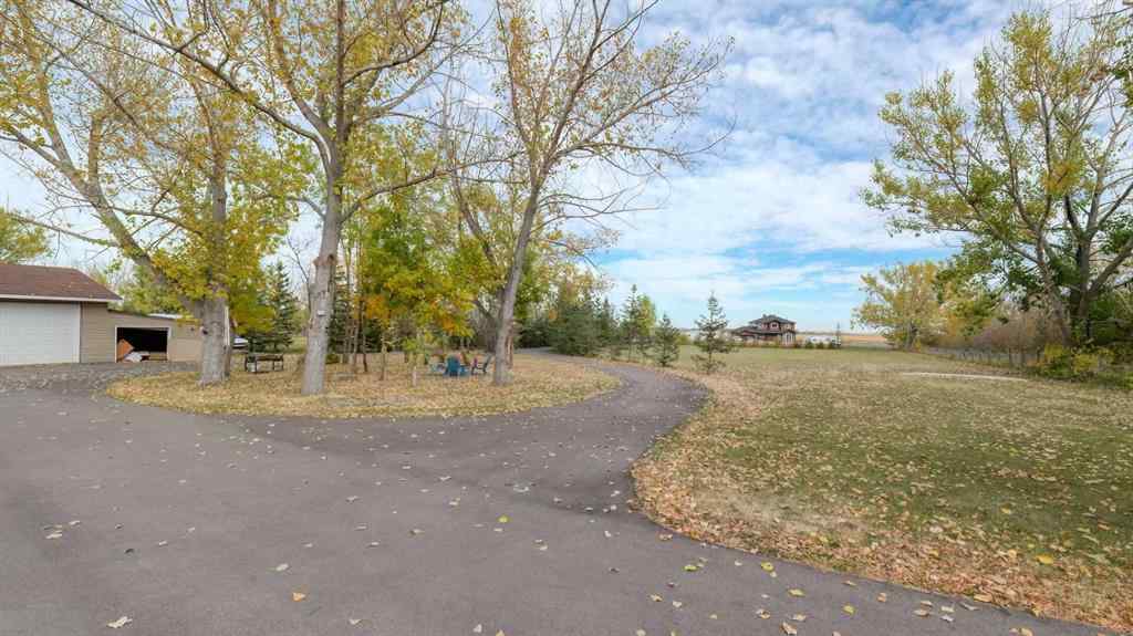 MLS® A2262909 - 247 Shore Drive  in Prairie Royal Estate Rural Rocky View County, Residential