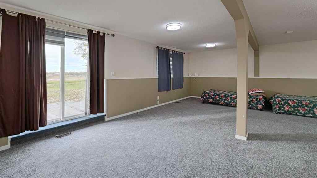 MLS® A2262909 - 247 Shore Drive  in Prairie Royal Estate Rural Rocky View County, Residential