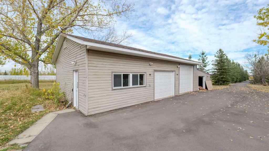 MLS® A2262909 - 247 Shore Drive  in Prairie Royal Estate Rural Rocky View County, Residential