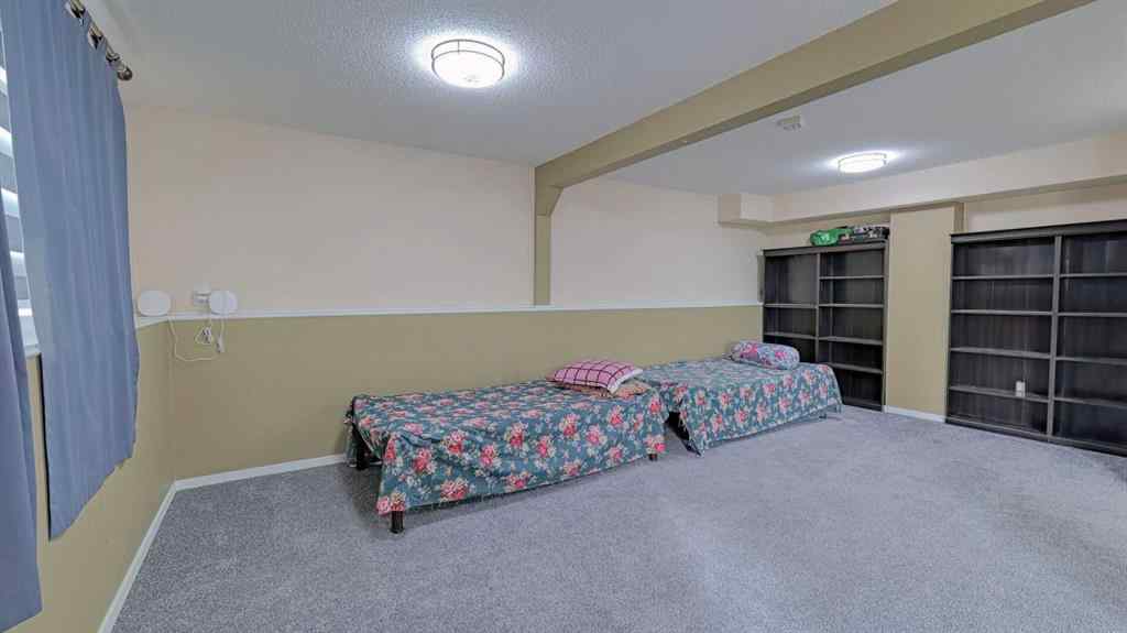 MLS® A2262909 - 247 Shore Drive  in Prairie Royal Estate Rural Rocky View County, Residential