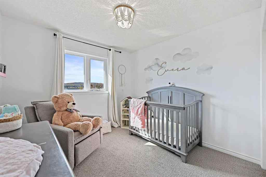 MLS® A2262912 - 52 West Edge Road  in West Valley Cochrane, Residential