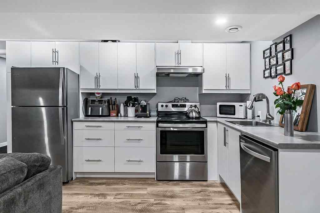 MLS® A2262916 - 128 Queen Alexandra Close SE in Queensland Calgary, Residential