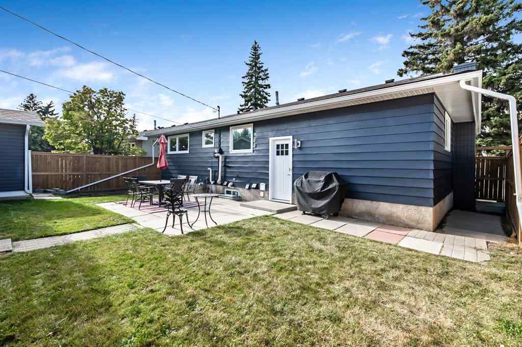 MLS® A2262916 - 128 Queen Alexandra Close SE in Queensland Calgary, Residential