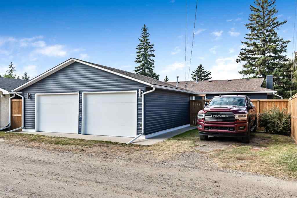 MLS® A2262916 - 128 Queen Alexandra Close SE in Queensland Calgary, Residential