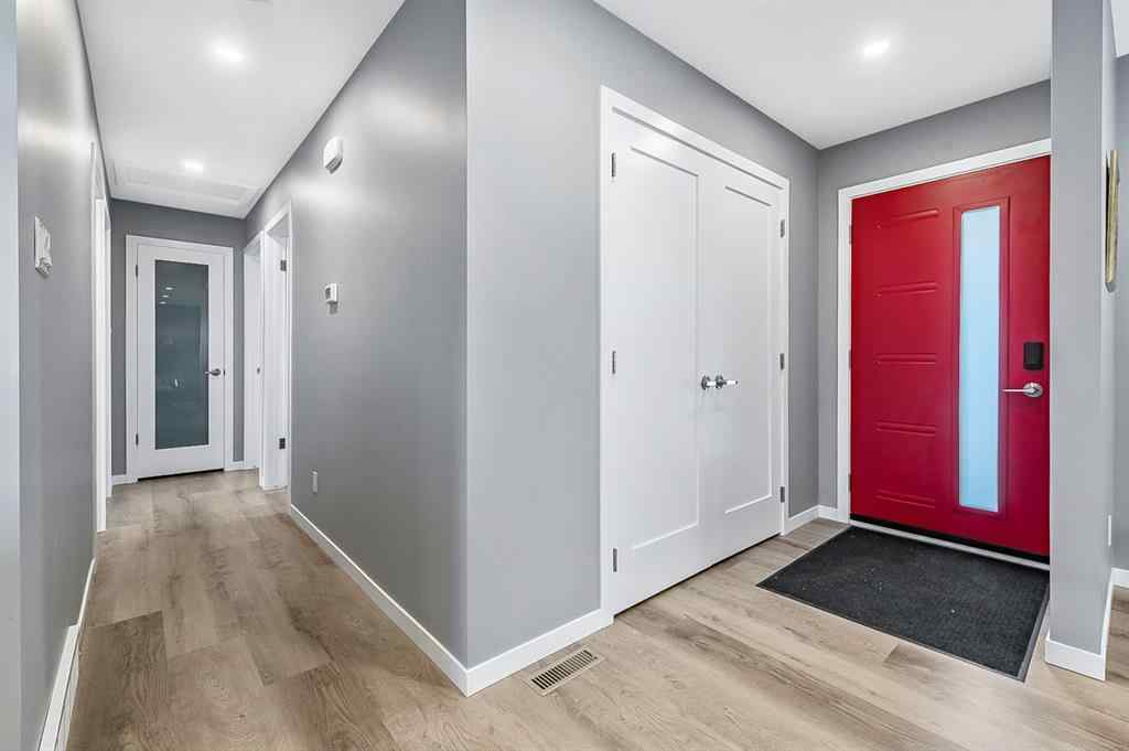 MLS® A2262916 - 128 Queen Alexandra Close SE in Queensland Calgary, Residential