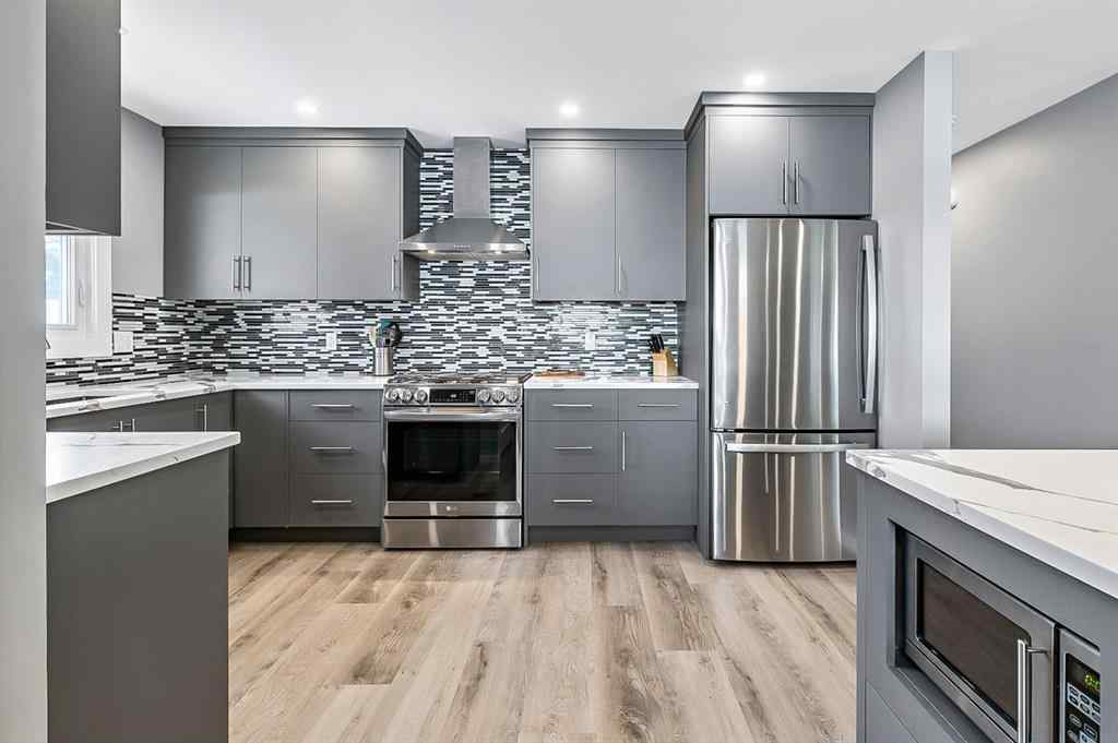 MLS® A2262916 - 128 Queen Alexandra Close SE in Queensland Calgary, Residential