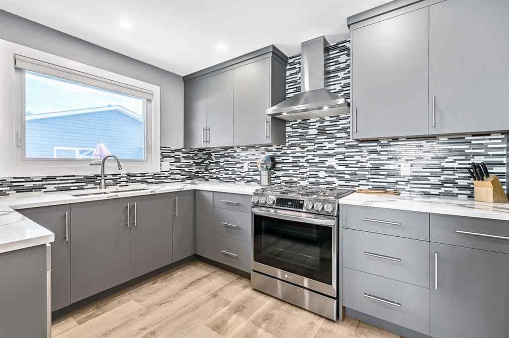 MLS® A2262916 - 128 Queen Alexandra Close SE in Queensland Calgary, Residential