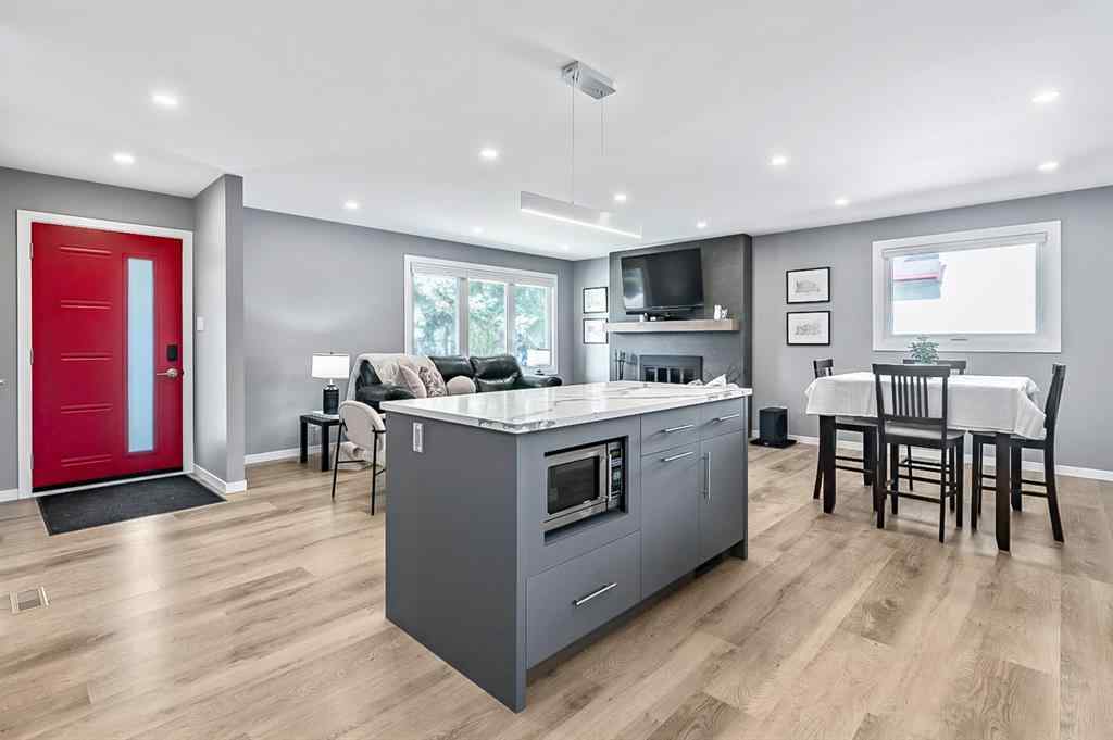 MLS® A2262916 - 128 Queen Alexandra Close SE in Queensland Calgary, Residential