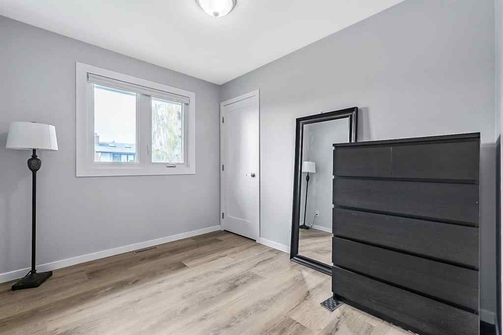 MLS® A2262916 - 128 Queen Alexandra Close SE in Queensland Calgary, Residential