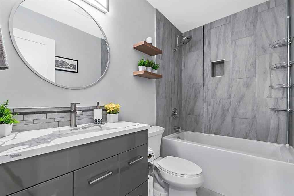 MLS® A2262916 - 128 Queen Alexandra Close SE in Queensland Calgary, Residential