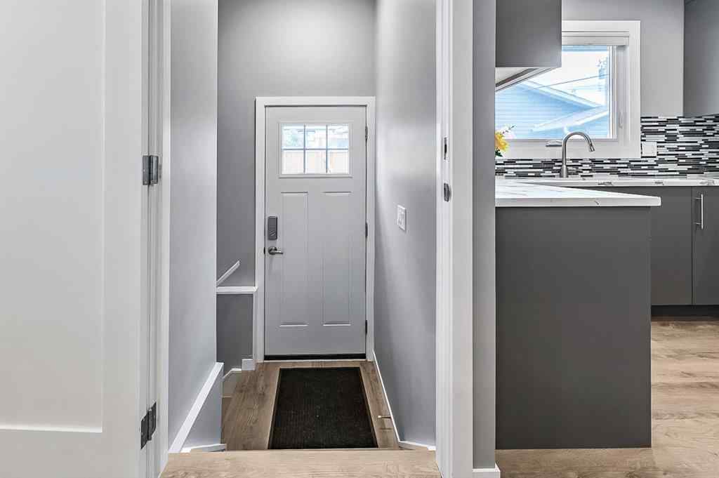 MLS® A2262916 - 128 Queen Alexandra Close SE in Queensland Calgary, Residential