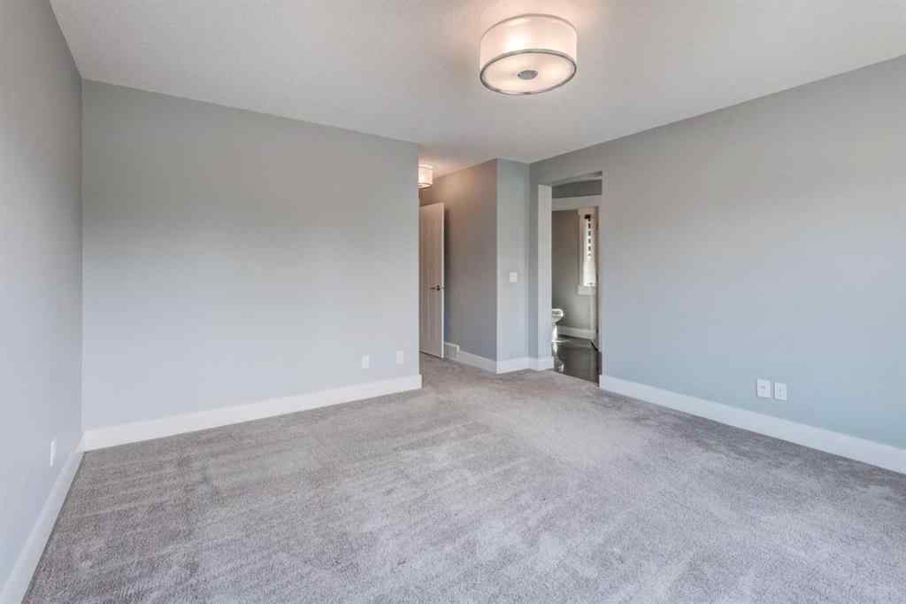 MLS® A2262928 - 112 Burma Star Road SW in Currie Barracks Calgary, Residential