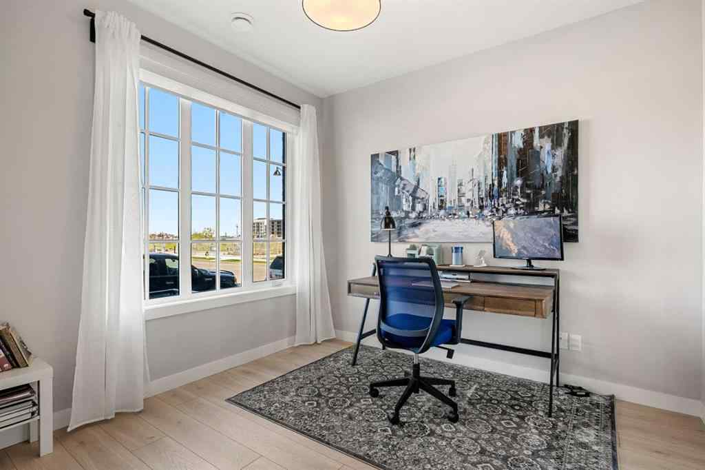 MLS® A2262942 - 8149 8 Avenue SW in West Springs Calgary, Residential