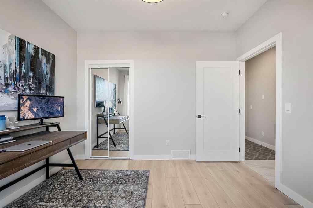 MLS® A2262942 - 8149 8 Avenue SW in West Springs Calgary, Residential