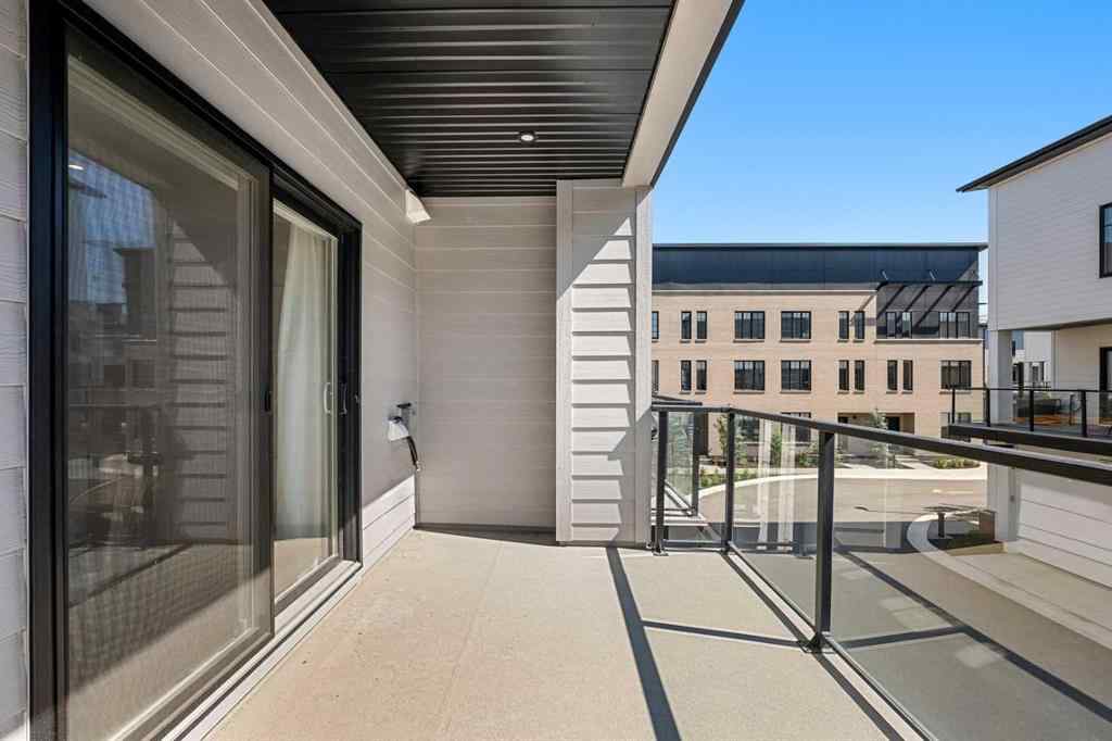 MLS® A2262942 - 8149 8 Avenue SW in West Springs Calgary, Residential