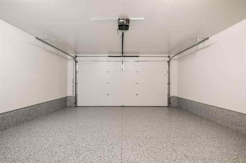 MLS® A2262942 - 8149 8 Avenue SW in West Springs Calgary, Residential