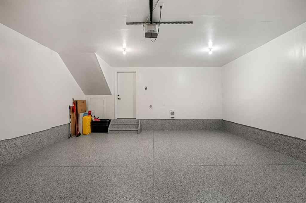 MLS® A2262942 - 8149 8 Avenue SW in West Springs Calgary, Residential