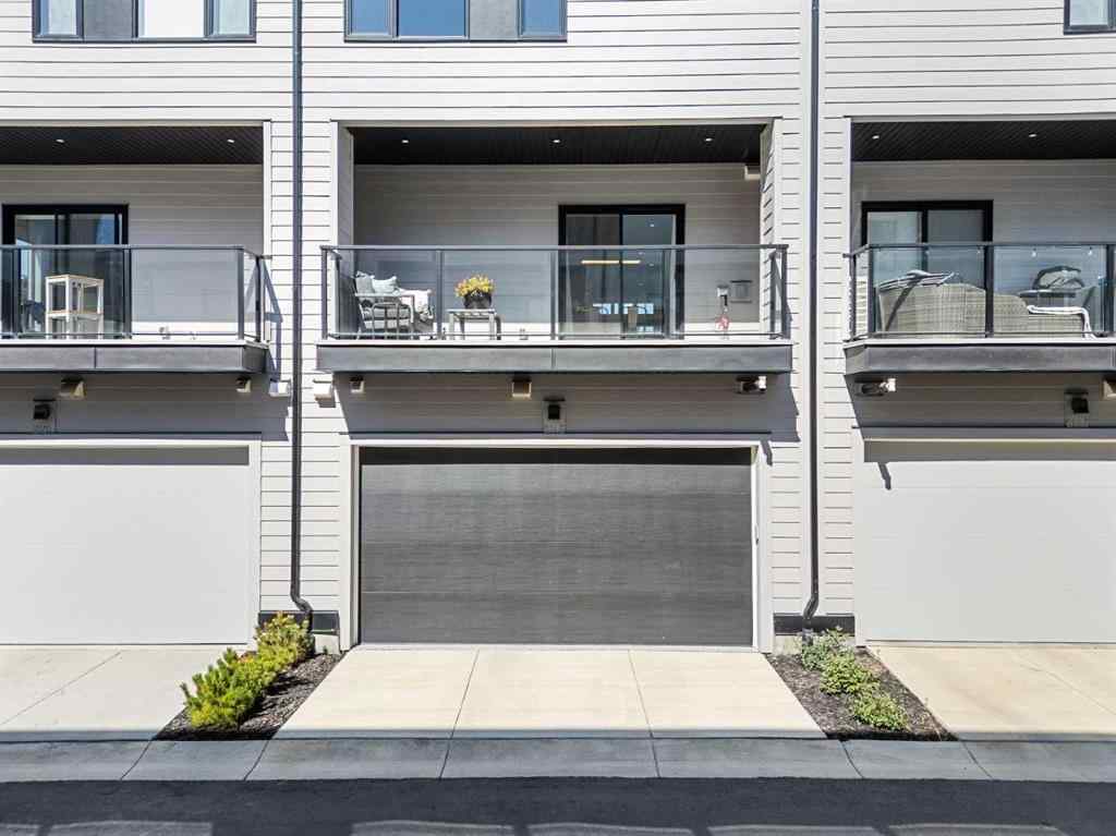 MLS® A2262942 - 8149 8 Avenue SW in West Springs Calgary, Residential