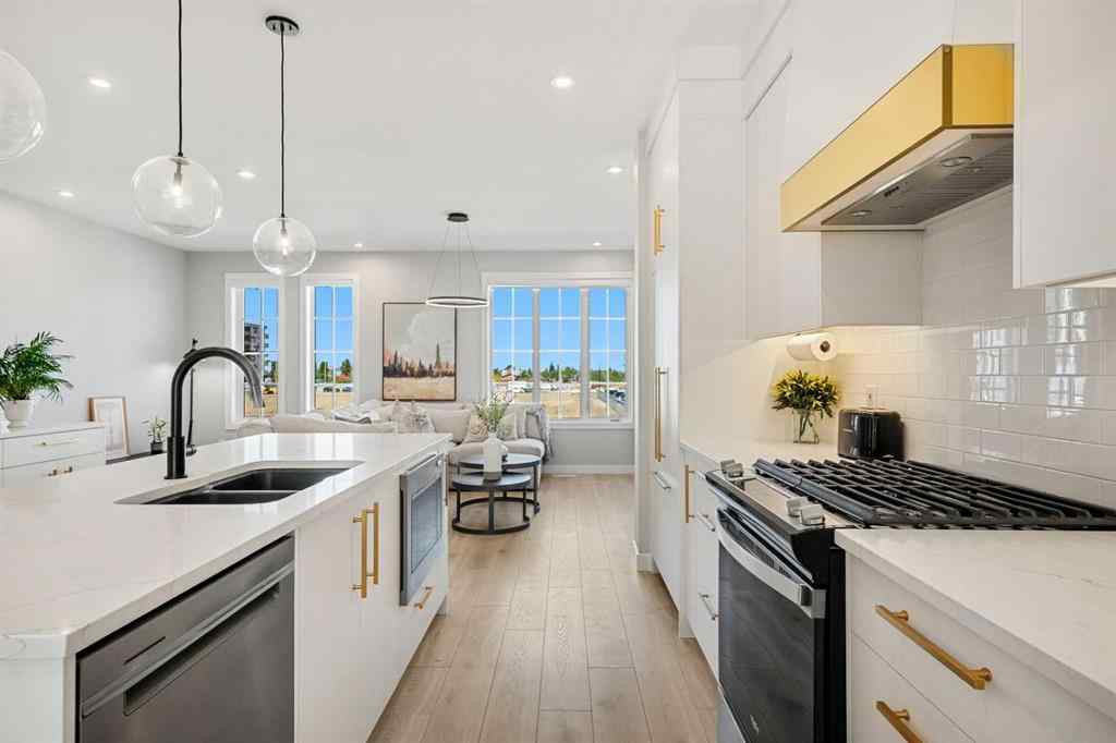 MLS® A2262942 - 8149 8 Avenue SW in West Springs Calgary, Residential