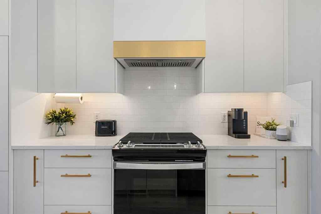 MLS® A2262942 - 8149 8 Avenue SW in West Springs Calgary, Residential