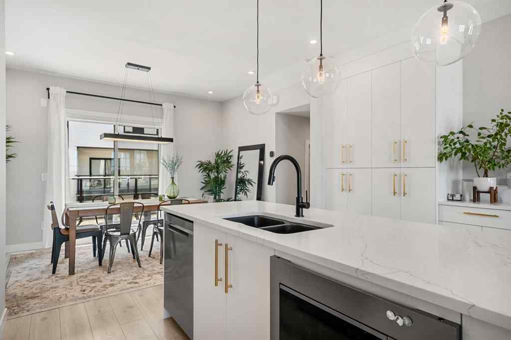 MLS® A2262942 - 8149 8 Avenue SW in West Springs Calgary, Residential