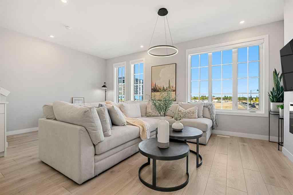 MLS® A2262942 - 8149 8 Avenue SW in West Springs Calgary, Residential